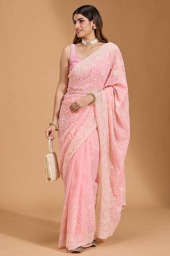 ethnic motifs embroidered georgette saree in pink