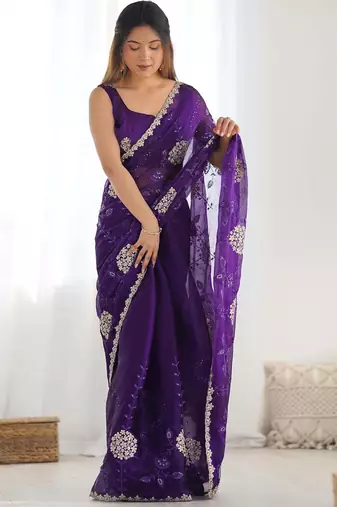 ethnic motifs embroidered georgette saree in purple