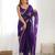 ethnic motifs embroidered georgette saree in purple