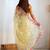 ethnic motifs embroidered georgette saree in yellow