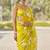 ethnic motifs embroidered georgette saree in yellow