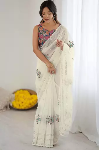 ethnic motifs embroidered georgette saree in white