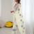 ethnic motifs embroidered georgette saree in white