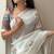 ethnic motifs embroidered georgette saree in white