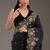 ethnic motifs embroidered georgette saree in black