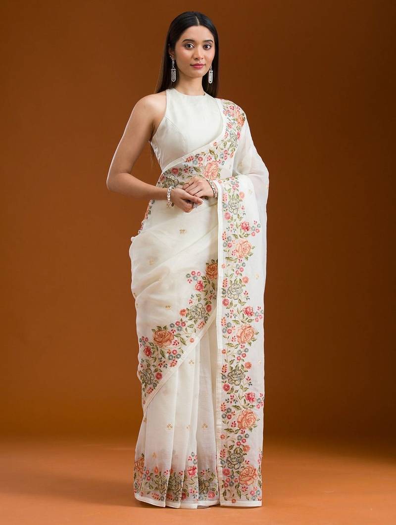 ethnic motifs embroidered georgette saree in white