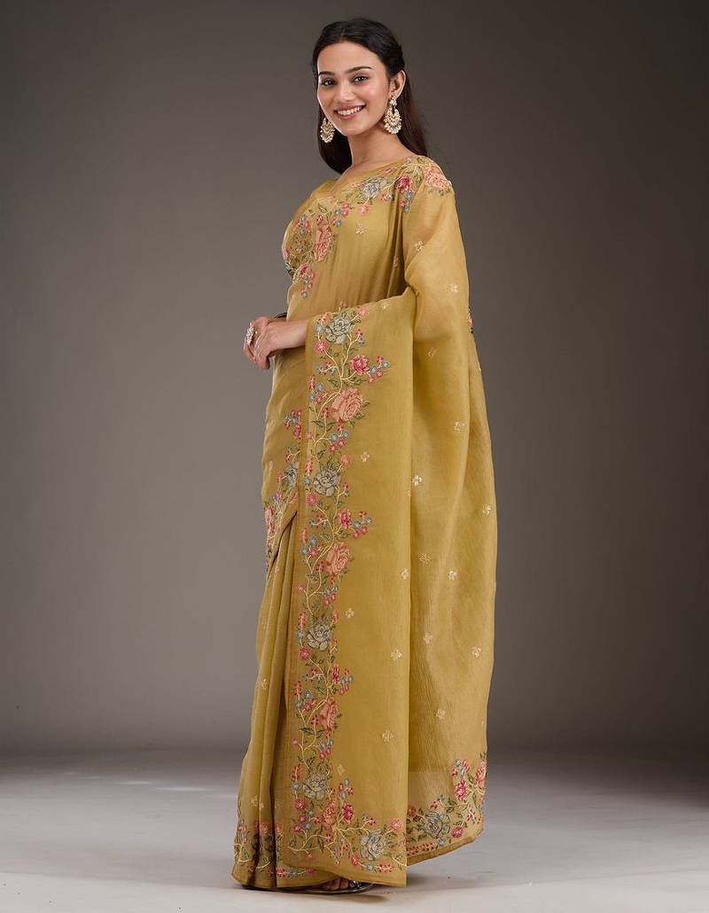 ethnic motifs embroidered georgette saree in yellow