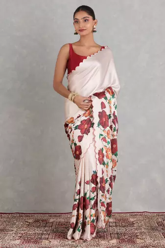 ethnic motifs embroidered georgette saree in yellow