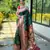 Dark green woven paithani silk saree with blouse piece