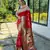 Red woven paithani silk saree with blouse piece