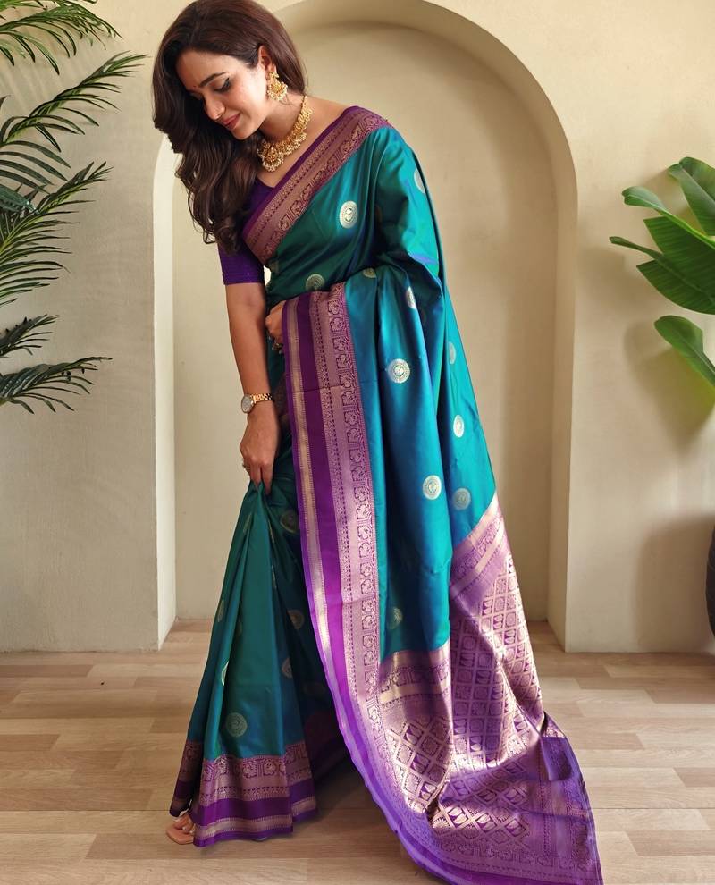 Turquoise woven silk saree with blouse piece