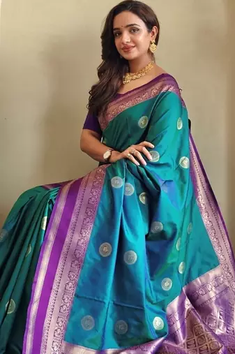 Turquoise woven silk saree with blouse piece