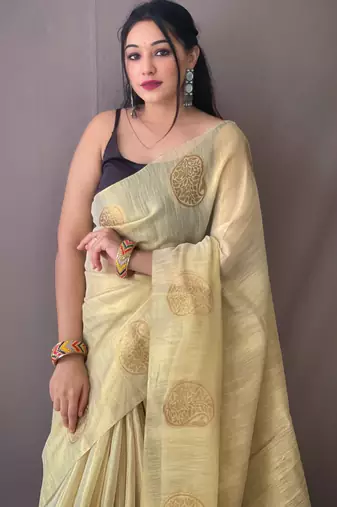 Beige woven tissue saree with blouse piece
