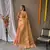 Peach woven tissue saree with blouse piece