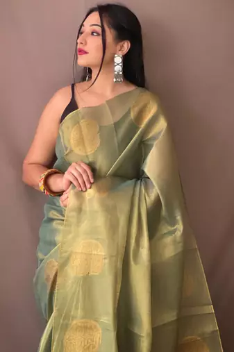 Green woven tissue saree with blouse piece