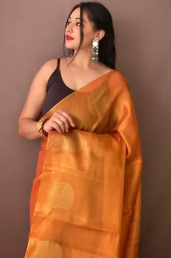 Orange woven tissue saree with blouse piece