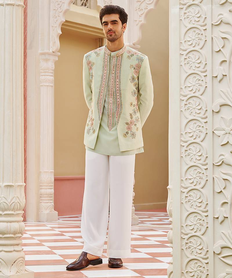 green silk kurta jacket set with embroidered floral work