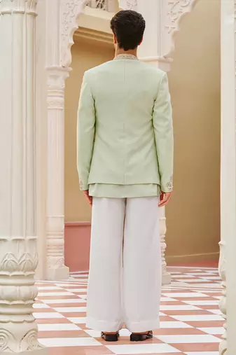 green silk kurta jacket set with embroidered floral work