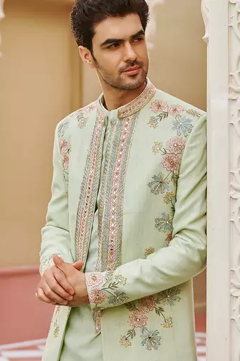 green silk kurta jacket set with embroidered floral work