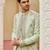 green silk kurta jacket set with embroidered floral work