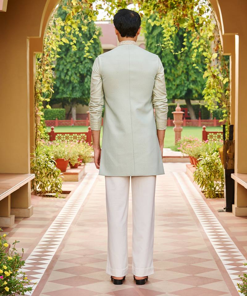 green jacquard silk kurta set with floral embroidered bandhgala