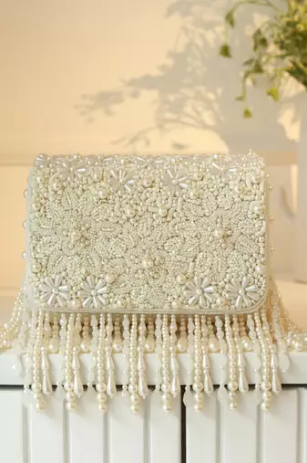 White suede pearl embroidered clutch