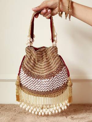 Gold suede pearl embroidered potli bag 5