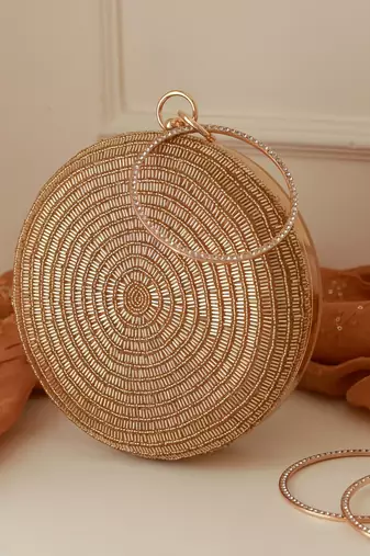 Gold silk round clutch