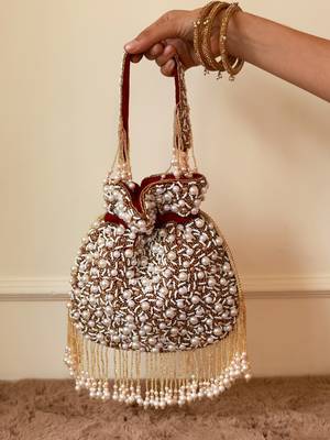Red suede pearl embroidered potli bag 5