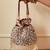 Red suede pearl embroidered potli bag