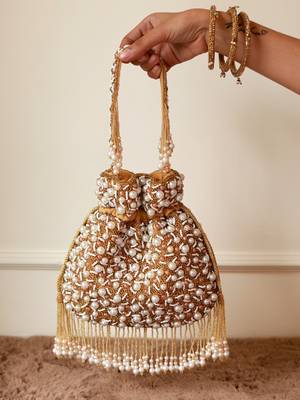 Gold suede pearl embroidered potli bag 5