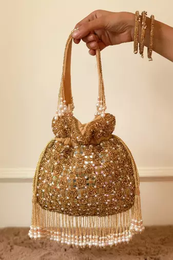 Gold suede pearl embroidered potli bag