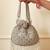 Grey suede pearl embroidered potli bag