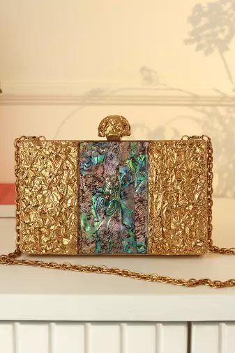 Gold suede embroidered clutch