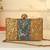 Gold suede embroidered clutch