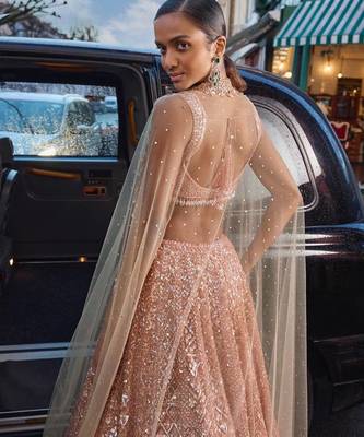 Peach Color Rainbow Sequins And Dori Work All Over Net Lehenga Choli 3