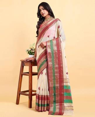 white cotton silk blend saree with red & green border 1