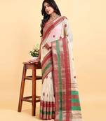 white cotton silk blend saree with red & green border