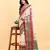 white cotton silk blend saree with red & green border