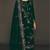 Green pure velvet semi stitched suit with heavy embroidery sequence work