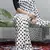 Black & white polka dot prints  heavy japan satin saree with unstitched blouse