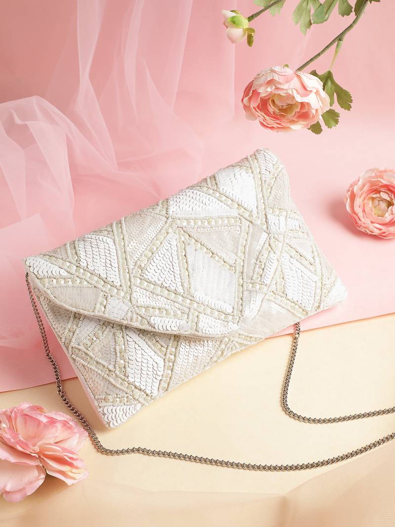 mod stitch ivory & white geometric sequined canvas sling bag