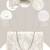 mod stitch ivory & white geometric sequined canvas sling bag