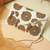 tassel tales ivory & metallic gold floral beadwork canvas sling bag