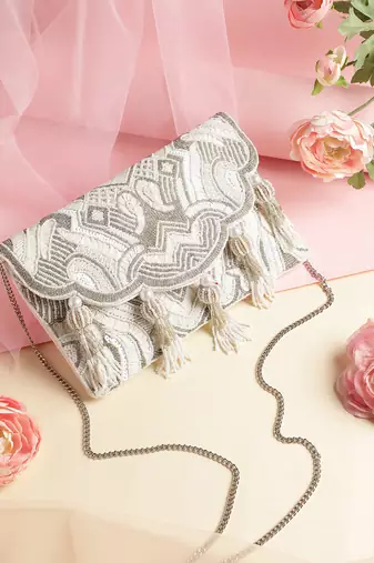 Tassel Tales Ivory & Antique Silver Ethnic Embellished Satin Sling Bag