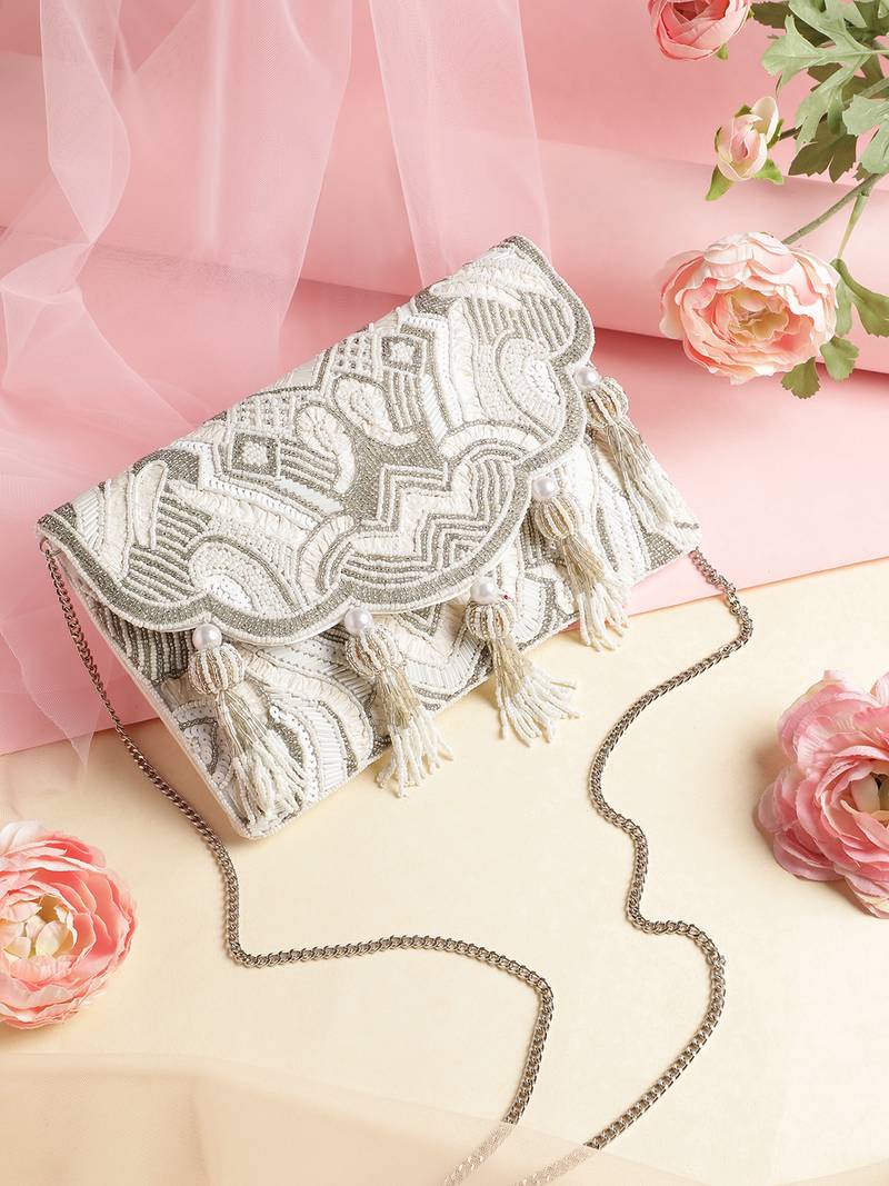 tassel tales ivory & antique silver ethnic embellished satin sling bag