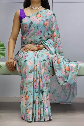 sky color  all over printed silk blend crape saree with unstitched blouse