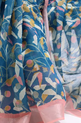 Rama color all over  printed with  silver zari border linen saree with unstitched blouse