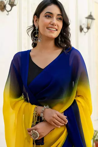 Yellow & blue color georgette solid saree with blue color blouse