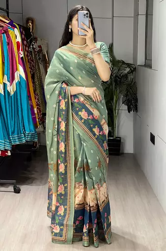 teal color  all over printed shimmer saree with unstitched blouse